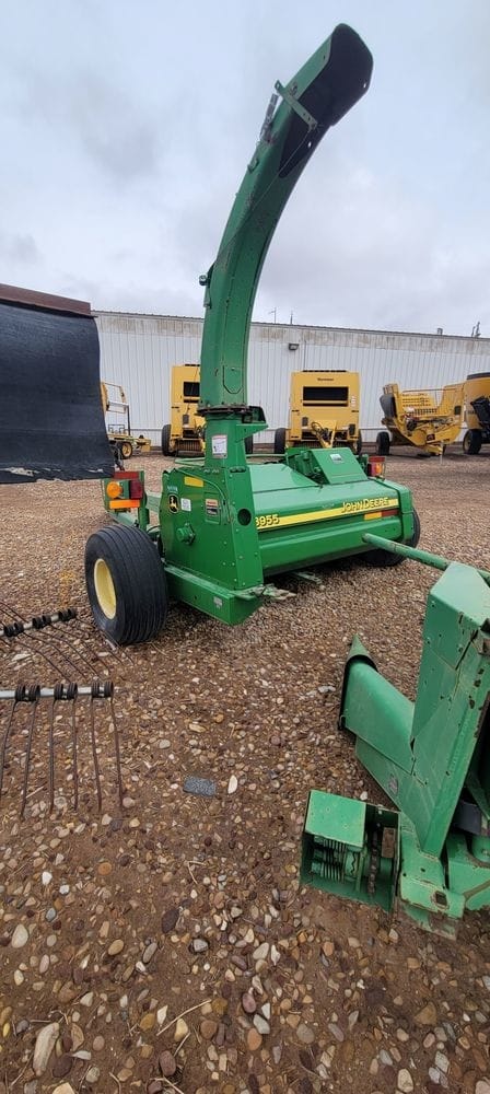 John Deere Forage Harvester and Corn Head.