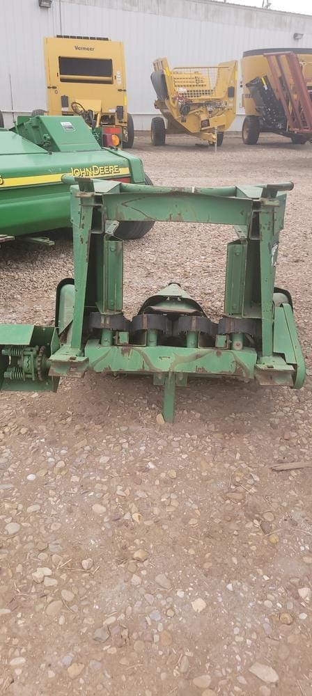 John Deere Forage Harvester and Corn Head.